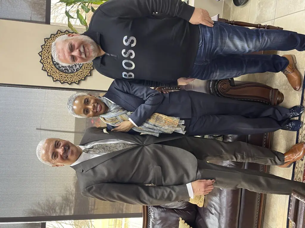 Anchor Huel Perkins, his wife, Priscilla Perkins and Publisher Osama Siblani, during a visit to The Arab American News, Wednesday, March 16 – Photo by The Arab American News