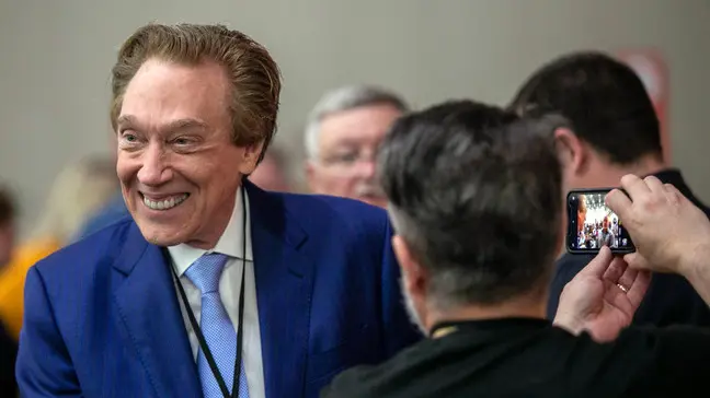 Republican candidate for Michigan Governor Perry Johnson greets supporters in the audience of the Michigan Republican Convention at Devos Place in Grand Rapids. Photo: Daniel Shular/AP