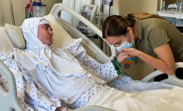 Lebanese woman sees son for first time since blast two years ago