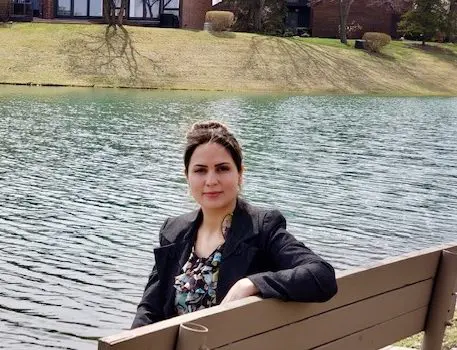 Nameer Alkurdi sits on a park bench