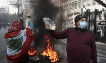 Lebanese protest record low value of local currency