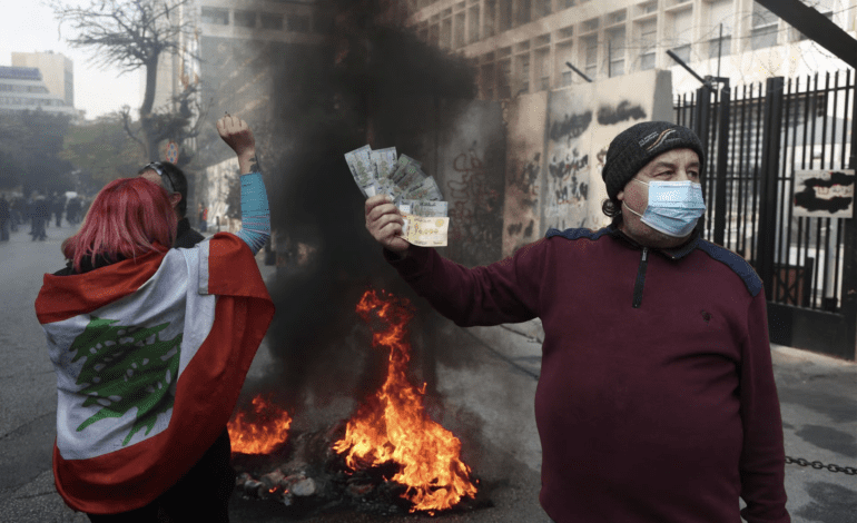 Lebanese protest record low value of local currency