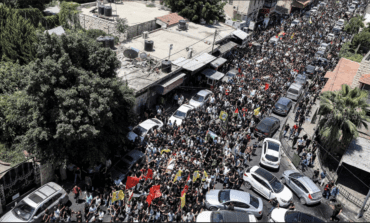 Palestinians paraded in defiance of Israel's Jenin assault and in protest against the Palestinian Authority