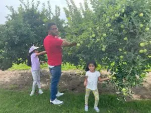 Yousef Mahmoud, of Ann Arbor, with his three children at Erie Orchards and Cider Mills in Monroe County in Erie, Michigan, on August 13, 2013. He alleges he and his family were threatened and racially harassed with anti-Muslim comments by the owner, who is heard on a video saying: "Every Muslim that comes in here steals from me."