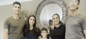 Saleh Humaid with the Hamed family of Dearborn Heights. – Screengrab