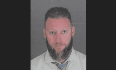 Judge dismisses charges against former Dearborn Heights officer in assault on Arab American officer, Wayne County prosecutor to appeal decision