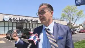 Azzam Elder speaks with Fox 2 Detroit reporter after his press conference on Friday, April 19.