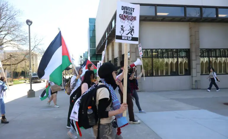 More than 100 faculty and staff at Wayne State University support student protesters