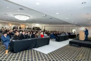 Nagi Almudhegi speaks to supporters as he officially announces his run for Dearborn mayor on Sunday, February 23, at the Fairlane Club in Dearborn.