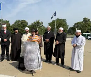 Imad Hamad speaking at Henry Ford Centennial library.