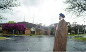 Sayyed Hassan Qazwini stands in front of the Islamic Institute of Knowledge building in Dearborn Heights. – File photo