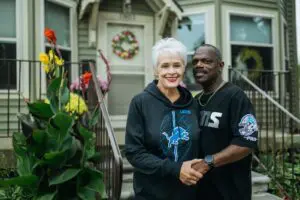 Lynne and Johnnie Williams outside their home in the Gratiot-Woods neighborhood