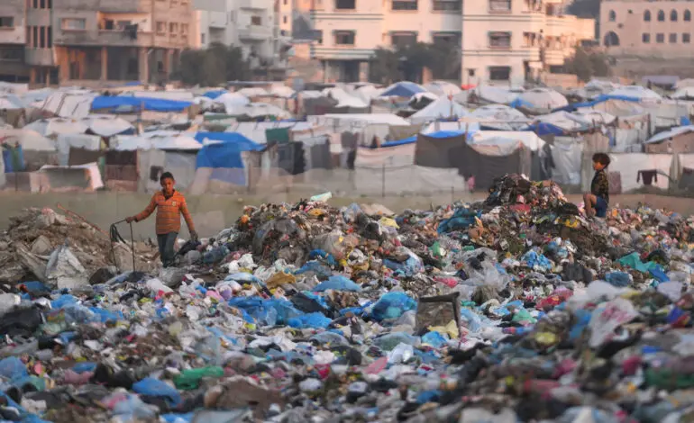 People in Gaza dig through garbage for things to burn to keep warm, a far cry from Trump’s vision