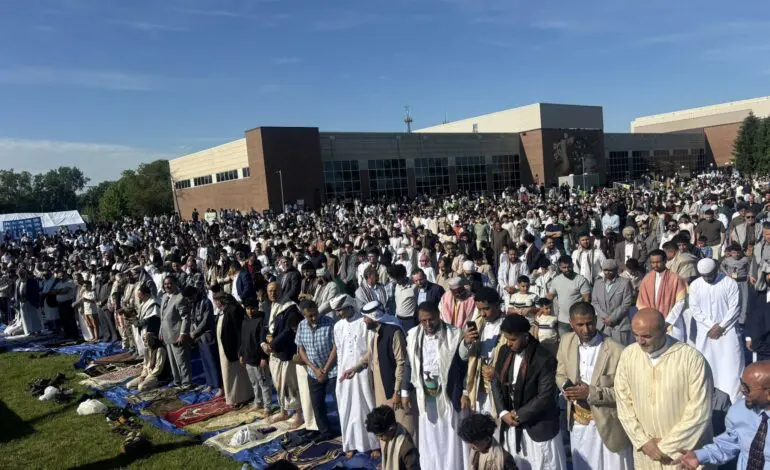 More than 10,000 Muslims gather for Eid al-Adha prayers in Dearborn as Christian clergy form human chain of solidarity