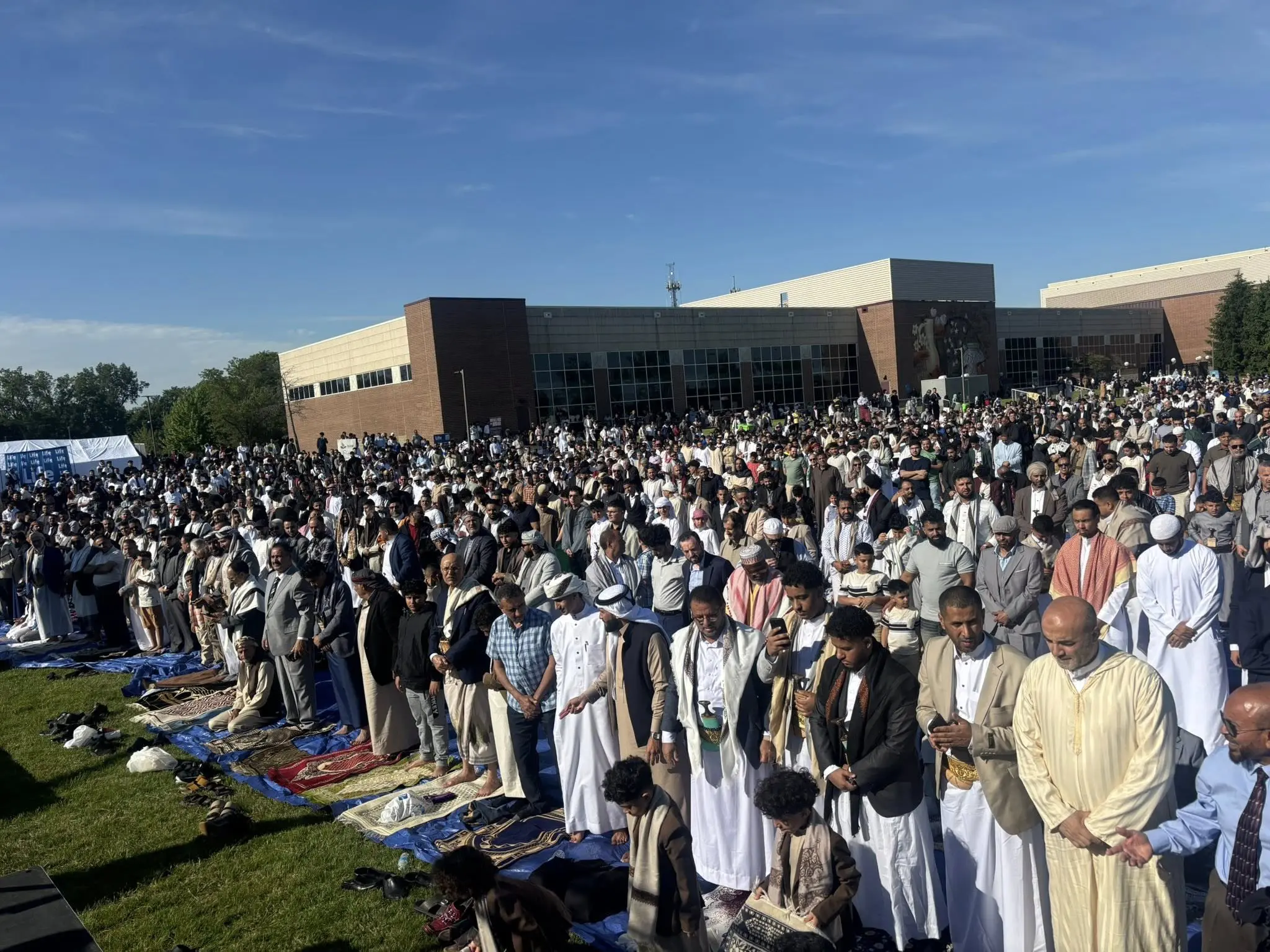 A view of the large Eid prayer gathering at the Ford Community and Performing Arts Center in Dearborn on Wednesday morning, May 27. – Photo by Abbas Shehab