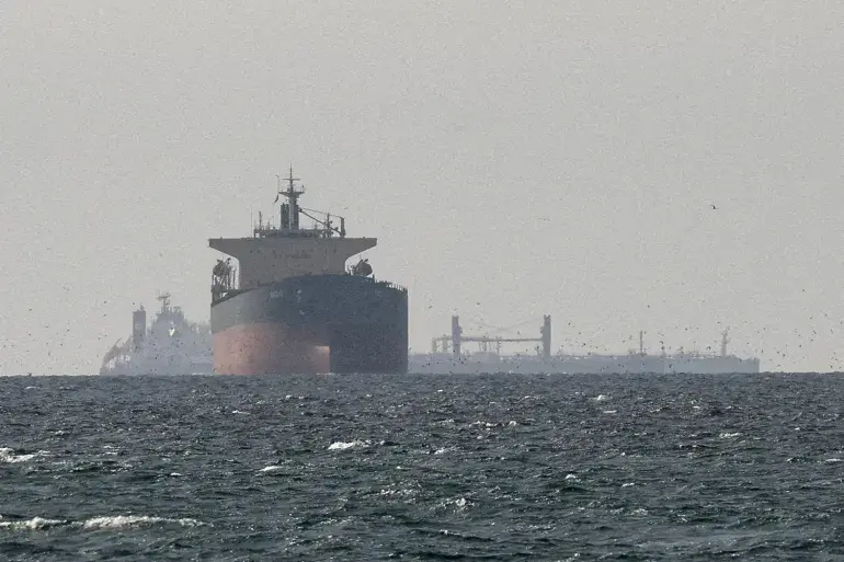 Cargo ships in the Gulf, near the Strait of Hormuz amid the US-Israeli conflict with Iran