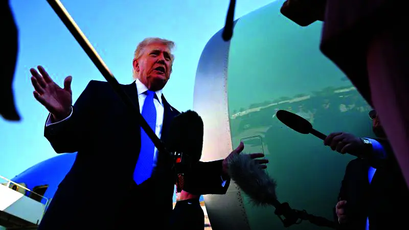 Trump speaks with journalist at Joint Base Andrews