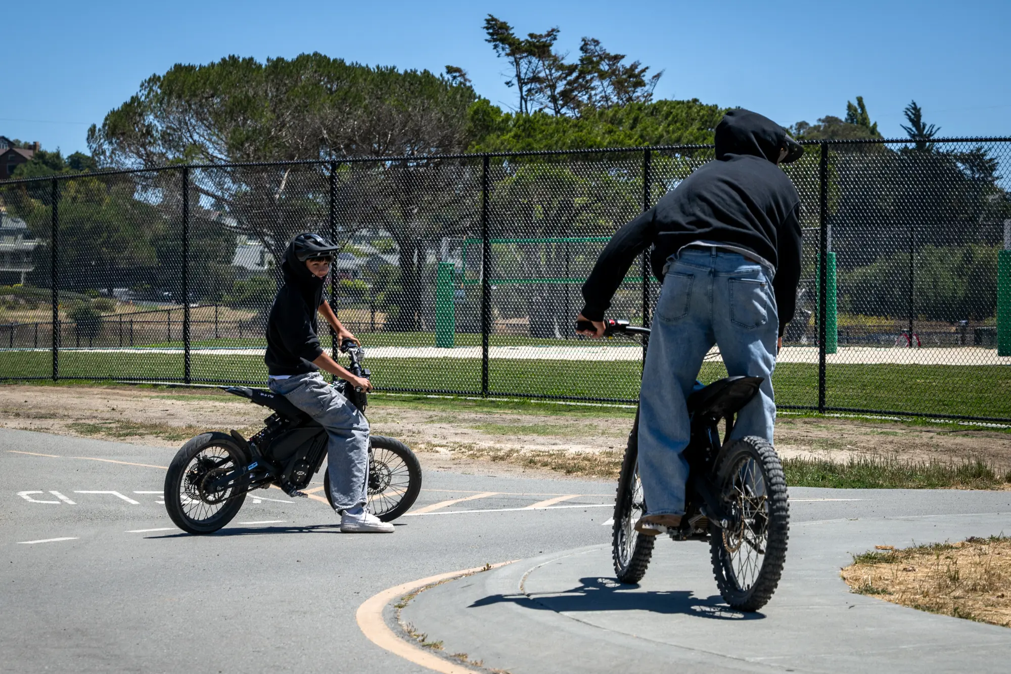 Kids ride electric bicycles