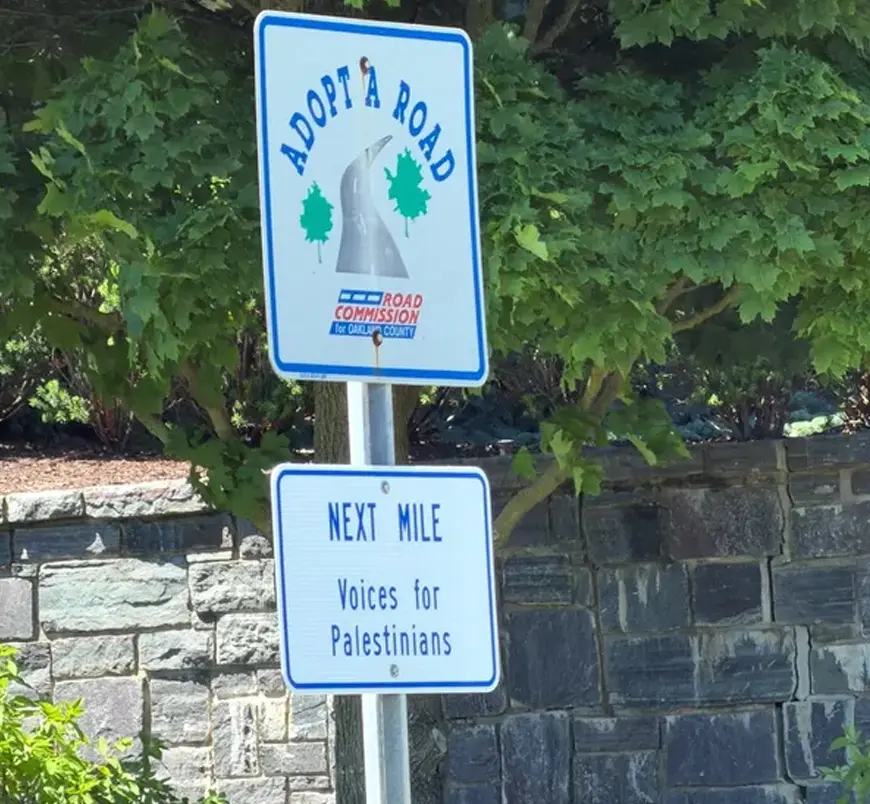 A “Voices for Palestinians” sign along Orchard Lake Road in West Bloomfield Township before it was removed last Sunday.