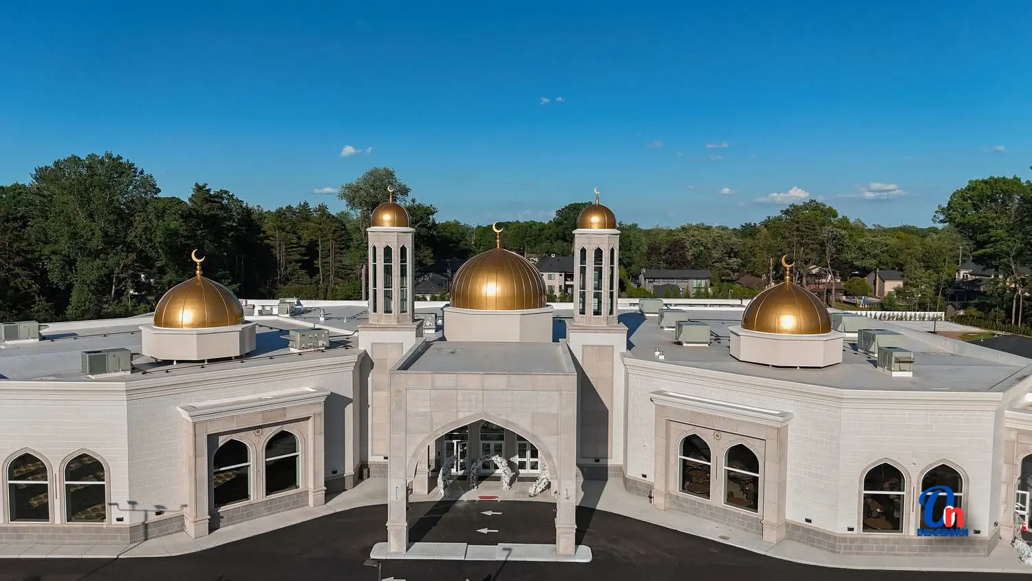 Hundreds Celebrate Grand Opening of Imam Al-Hasanain Mosque and New Islamic Institute of America new Headquarters in Dearborn Heights on June 6. - Photo by Abbas Shehab