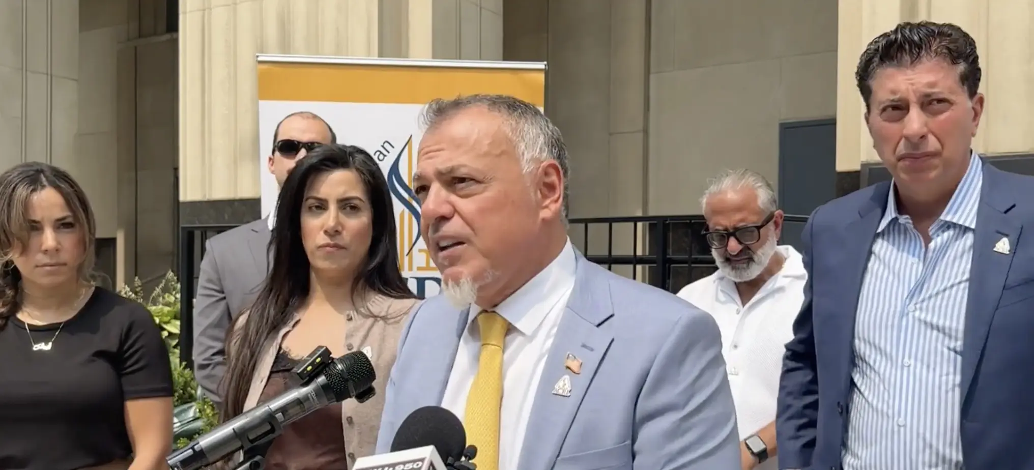 Attorney Nabih Ayad, founder of ACRLspeaks during a press conference outside the federal courthouse, announcing the filing of the lawsuit in Detroit on Tuesday, August 11. – Video grab