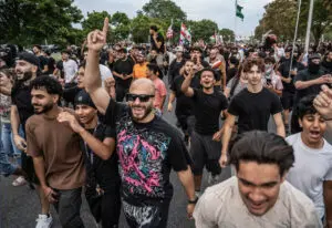 Crowds of Arab American demonstrators arrive at the protest site