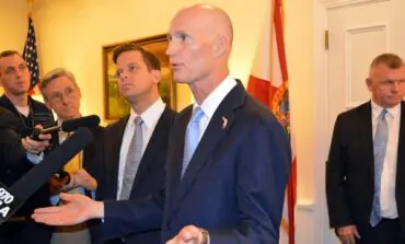 Note to Rick Scott: Stop tweeting and cut up that government credit card