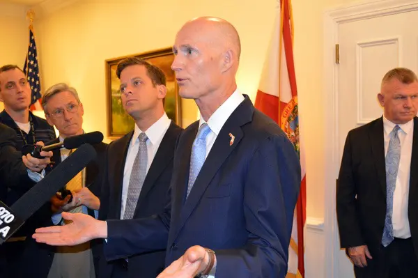 Note to Rick Scott: Stop tweeting and cut up that government credit card