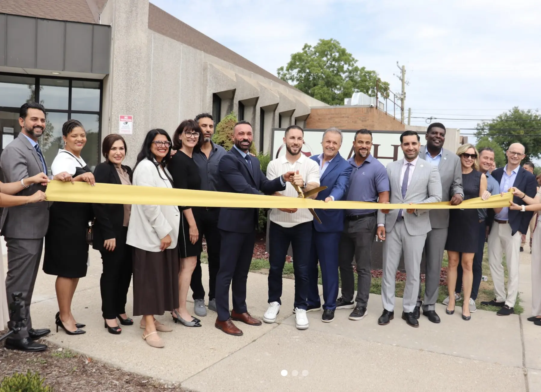 Wassim Mahfouz, Dearborn Mayor Abdullah Hammoud joined by elected officials and community organizations leaders during cutting of the ribbon to officially open LAHC’s new center on Kenilworth Street. - Instagram photo