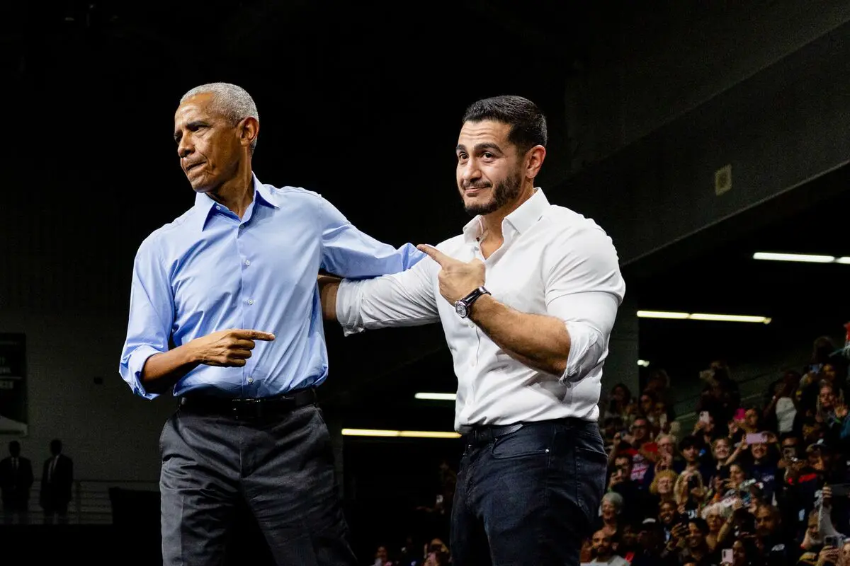 The Michigan Senate battle heats up as Obama and Trump hold rival rallies