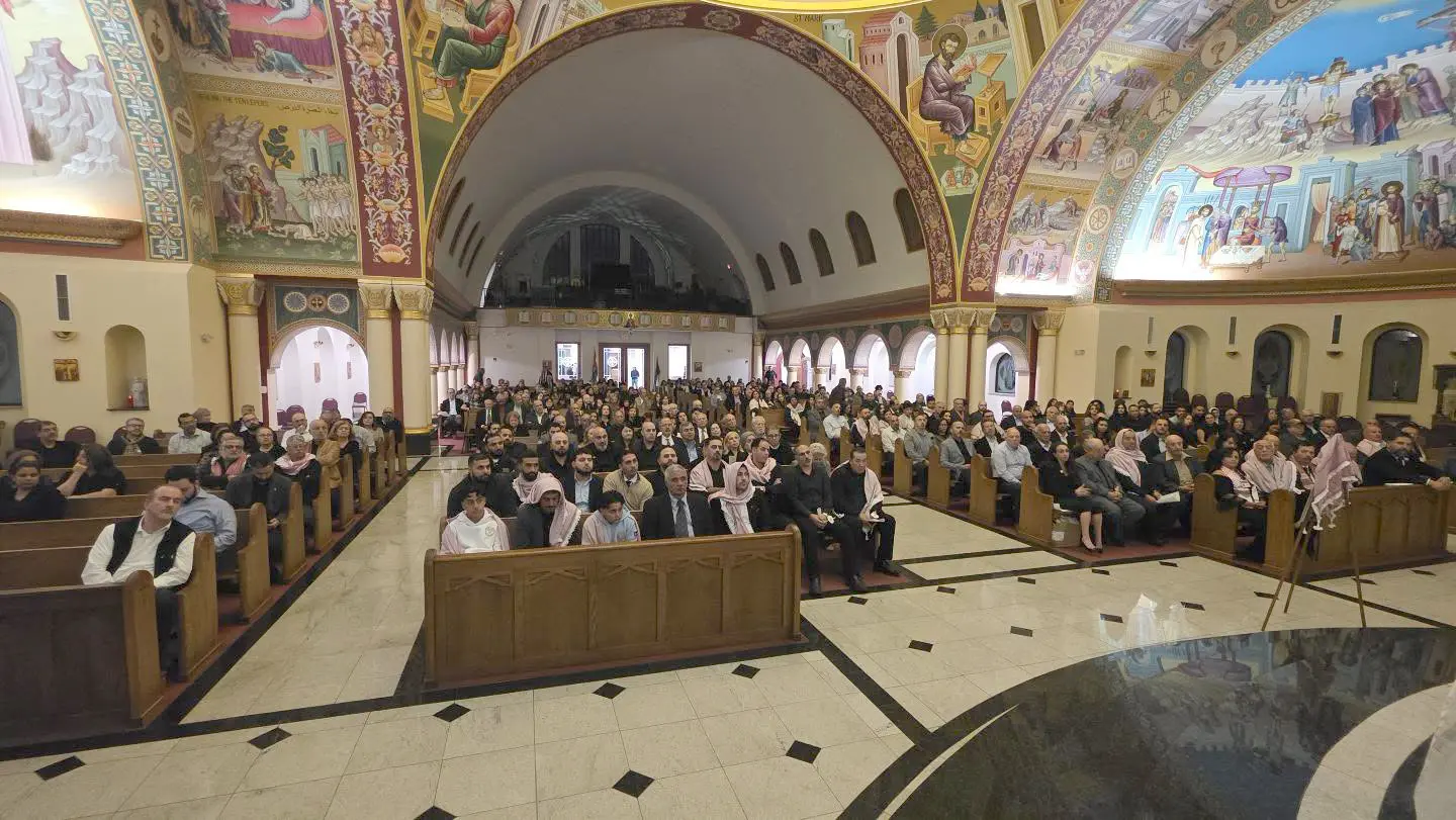 Mourners at St. Mary Orthodox Church in Livonia last Sunday.