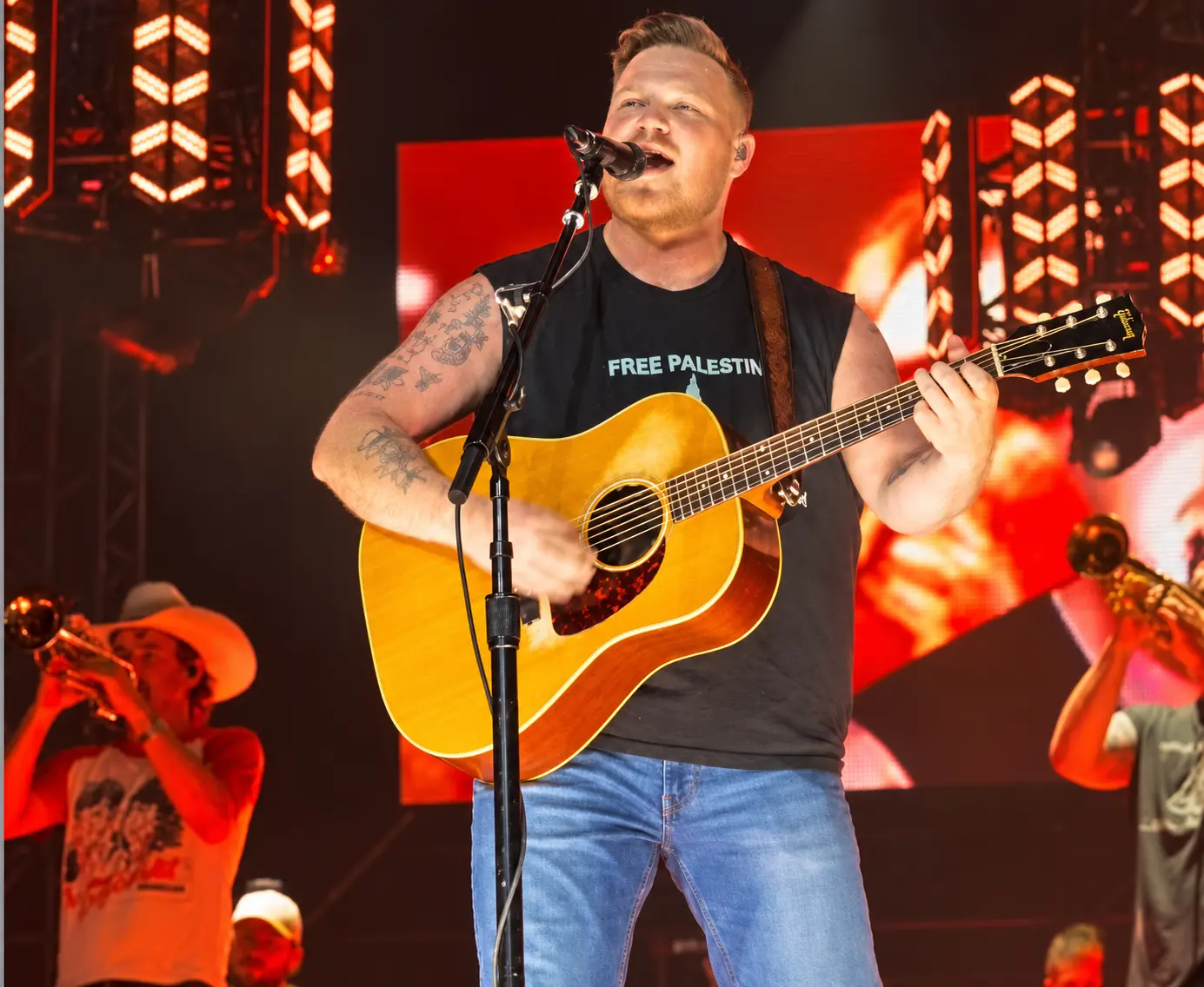 Zach Bryan wears Free Palestine shirt during Gillette Stadium show after Macklemore tour controversy