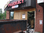 Van crashes into pharmacy