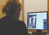 Scholars protest full-body scanners