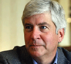 Snyder vetoes three voter restriction measures, signs 11 election reform bills into law