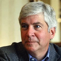 Snyder vetoes three voter restriction measures, signs 11 election reform bills into law
