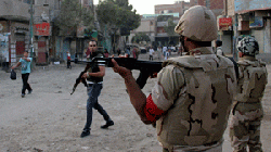 Security forces storm pro-Morsi town near Cairo to reassert control