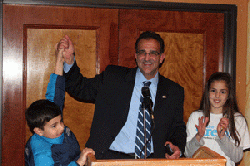 Mike Sareini celebrates victory with supporters