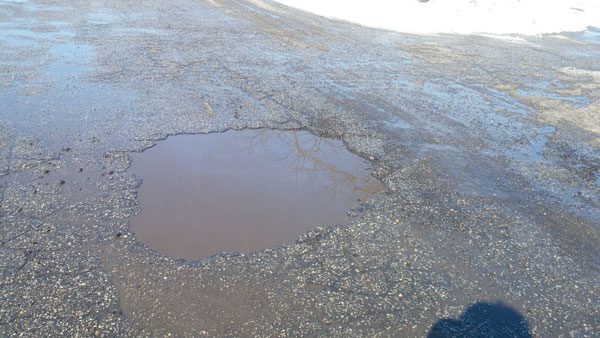 Potholes harm residents, challenge city, county and state agencies