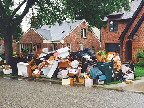 Dearborn Scavengers to receive $500 ticket for going through residents’ trash after flood