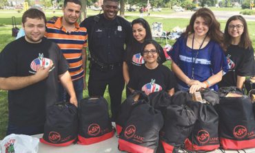 Youth helps needy through LAHC Feeding our Neighbors program