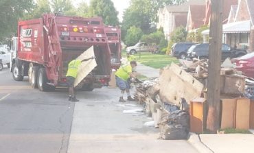 125 trash trucks sweep through Dearborn's neighborhoods, remove flood damaged items