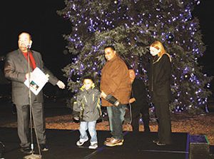 Mayor O'Reilly, Lowrey student light the City of Dearborn Christmas tree