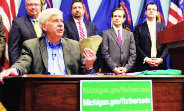 Gov. Snyder signs road funding legislation