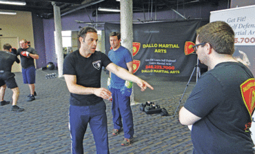 Students center of attention at Dallo Martial Arts