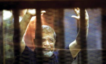 Mohamed Morsi died in court, in a soundproof cage under guards' watch