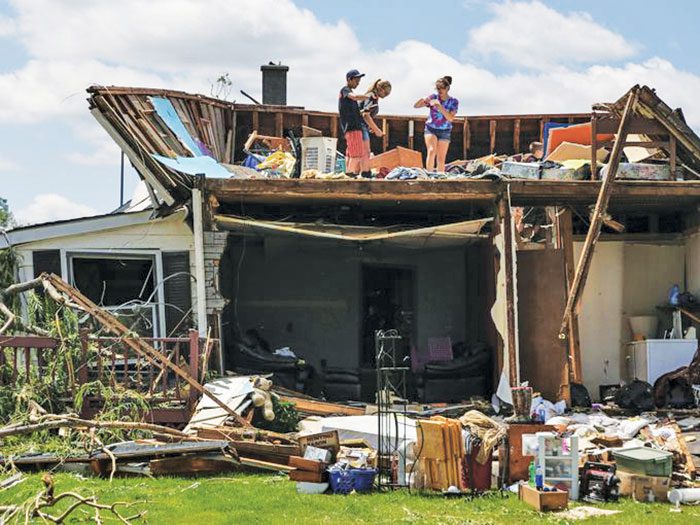 Homes And Buildings Damaged After Tornadoes Hit The Region