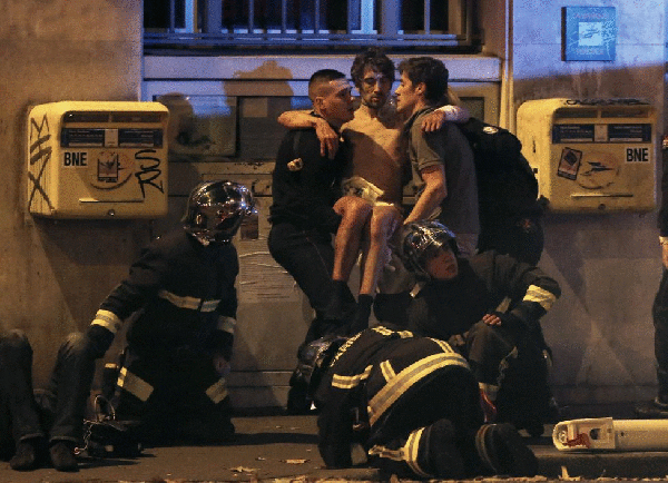 At least 140 people killed in Paris shootings, explosions