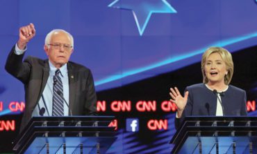 Clinton, Sanders take new combative tone ahead of New Hampshire primary