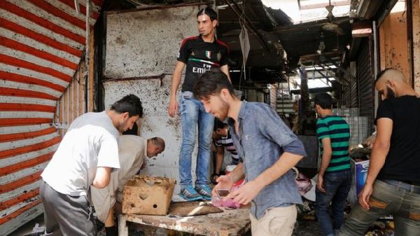 Bombs kill dozens in Baghdad